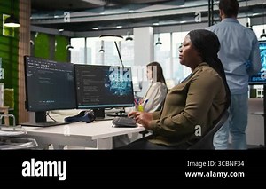 Female technician writing code on PC, developing neural networks APIs. System administrator using computer to troubleshoot software errors with artificial intelligence technology, camera A Stock Video Footage - Alamy