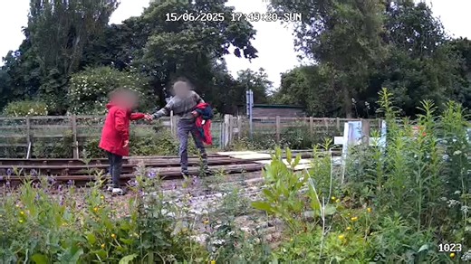Moment walkers risk their lives using railway bridge as 'dangerous shortcut'