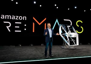 Amazon unveils its redesigned 'hybrid' delivery drone, featuring helicopter and plane flight modes