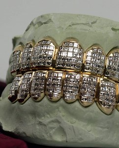 64K views · 650 reactions | Fresh out the kitchen! Brand new set of Diamond Grillz for my brother, Paul Wall. Carre Cut Invisible Set Diamond Grillz with Yellow Gold  Ready for a set of custom Diamond Grillz from Johnny Dang & Co? Reach out to my VIP Sales Team at (832) 846-9669.  Shop my Online Store: JohnnyDangandCo.com Or visit me in-store at: 6224 Richmond Ave. | Johnny Dang & Co. | Facebook