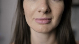 Woman brushing her teeth in the morning - Free Stock Video