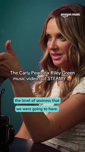 Wearing her nightgown at 9:30 in the morning, @Carly Pearce was not expecting her “If I Don’t Leave I’m Gonna Stay” music video with @Riley Green to be THAT steamy. Carly sat down with Kelly Sutton and Amber Anderson on @Amazon Music’s Country Heat Weekly to talk about the video and Riley’s full commitment to the role. #CarlyPearce #RileyGreen #CountryMusic