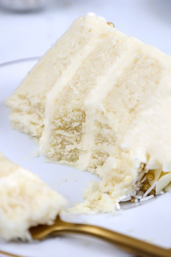 This WASC cake recipe makes the ultimate white cake and is perfect for any special occasion! It's made from scratch has a delicious hint of almond and is so moist and tender! Get the recipe here: https://chelsweets.com/wasc-cake/ | Chelsweets