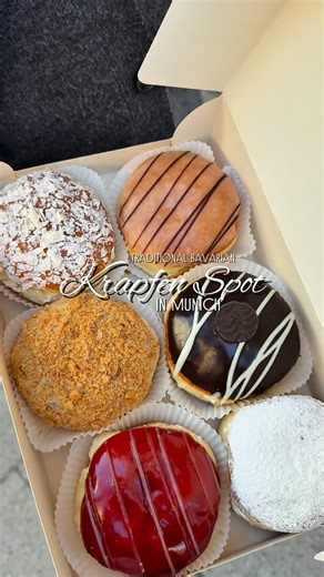 MUNICH‘S PLACES TO BE on Instagram: "anzeige/ad: *GIVEAWAY* Traditional bavarian Krapfen spot in Munich 🤩😋 From classic, eggnog, chocolate or vanilla pudding to rum, rosehip, bee sting — plus weekly specials like Nutella, pistachio mascarpone or raspberry mascarpone 😋 The selection at @baeckerei.schifferl is honestly hard to beat, and every Krapfen is freshly baked throughout the season ✨ Behind all of this variety is real Bavarian craftsmanship. Since 1910, Bäckerei Schifferl has been a true