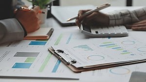 Business Documents, Auditor businesswoman checking searching document legal prepare paperwork or report for analysis TAX time,accountant Documents data contract partner deal in workplace office