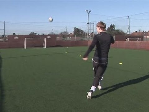 How to kick a football really far