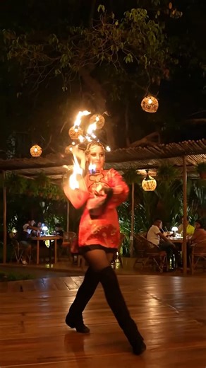 Mihir Negandhi on Instagram: "Fire is not her element, it’s her language! Elisa turning flames into art across the world. Shot & edited by me. [Fire performance, Fire artist, Flame art, Stage performer, Live performance, Artistic fire, Performance art, International performer, Fire choreography, Visual storytelling, Goa shoot, Creative reel, Cinematic capture, Artist spotlight, Event performer, Talent showcase, Performance photography, Reel edit, Artistic expression, Global performer] #FireArtis