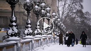 Eurostar trains and hundreds of flights cancelled amid heavy snowfall