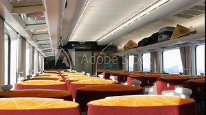 interior view inside express train cabin while running moving through snowy landscape area in northern japan. inside train japan public transportation