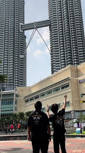 Exploring the Iconic PETRONAS Twin Towers with Friends and Family