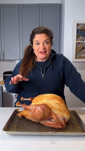 Alex Guarnaschelli The “ICAG” on Instagram: "Here's the cheesecloth method without stuffing or trussing the turkey so you can see this process in its simplest form. By all means, stuff, brine, spatchcock or brine your turkey! NOT finished cooking the bird but showing the cheesecloth "peel off" moment. Then we go back in the oven at 350F until the juices run clear (not pink) the top skin browns and the thigh meat is at 165F."