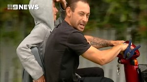 Man tows fishing boat on mobility scooter