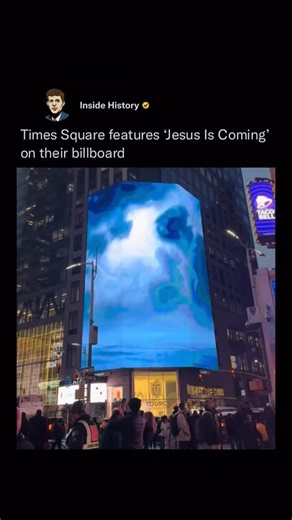 Inside History on Instagram: "A Times Square billboard displays the message “Jesus Is Coming,” standing out amid the bright lights and nonstop movement of the area. The message is intended to convey the belief that Jesus will return for a second time in the near future. Its bold simplicity contrasts with surrounding advertisements, drawing attention and sparking conversation about faith and its presence in public, commercial spaces. (Via: hju1iano & sammacko/TT)"