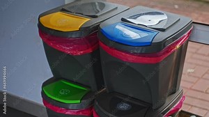 Set of Recycling Friendly Garbage Bins for Waste Sorting and Seperation with Colorful Lids and Symbols
