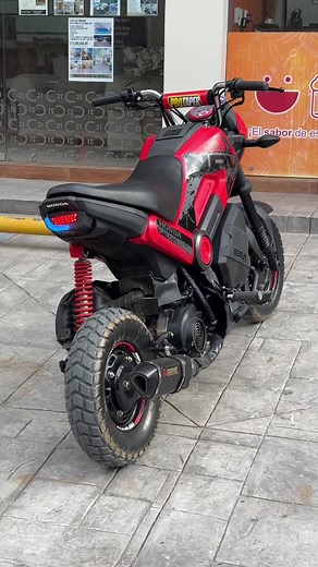 Custom Honda Navi with Off-road Tires and Integrated Tail Light