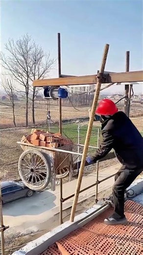 Homemade Hoist Lifts Bricks to Rural Roof