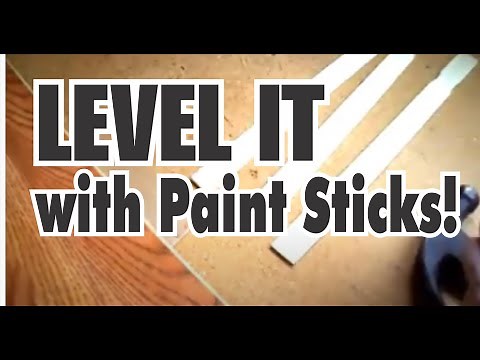Level a Subfloor for Laminate Flooring with Paint Sticks and Luan Plywood