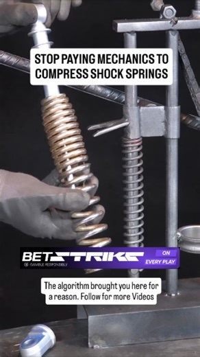 🔥​This manual spring compressor station uses a heavy-duty steel frame and a long-handle lever to safely collapse automotive coils. The shock is placed between two adjustable plates and secured with a chain-linked pressure system to prevent dangerous slippage. Pumping the handle compresses the spring in seconds allowing for the quick removal of top nuts and the swap of damaged dampers without a hydraulic press. Save this to manifest a workspace where even the toughest suspension jobs are effortl