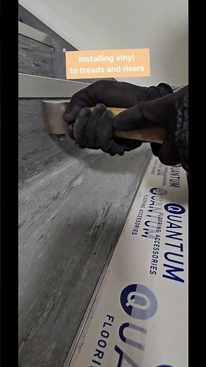 installing vinyl to treads and risers with double sided tape using mini cove former & new Nosings