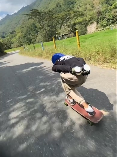 Longboard Tricks by Raziel Arenales