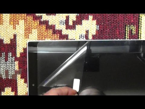 installing a screen protector film - iPad Lenovo tablet