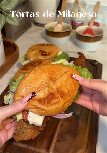 Hubbys request 😋🤎 Ingredients: -Meat is milanesa and I cut the pieces in half -Progresso garlic & herb breadcrumbs -Flour & eggs seasoned with garlic salt, paprika, & pepper -Fry your milanesas until nice and golden brown! -I added a little mayo to my bolillo before adding them to my comal •Top your tortas with the toppings of choice I used: -Mayo -Beans -Guac -Lettuce -Onion -Tomato -Jalapeños -Queso fresco -Black pepper • ENJOY 😋 • • #tortas #cenaparamiesposo #recetasfaciles #recetas #fyp