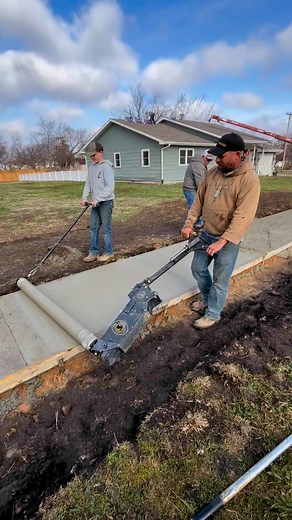 Check out this young homeschooler as he gets hands-on experience with the Batt Screed! Learning about trades at a young age is valuable and deserves encouragement and celebration. Whether it’s using a roller screed or a 2x4, every method has its place in the concrete construction world. | Curb Roller Manufacturing