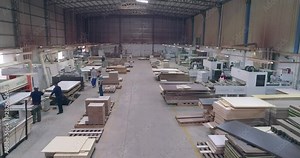 Manufacture of furniture from wood boards and MDF. Workshop work in a furniture factory.