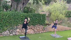 Yoga at home with these gorgeous gals. But where did my leg go? | Catherine Zeta-Jones