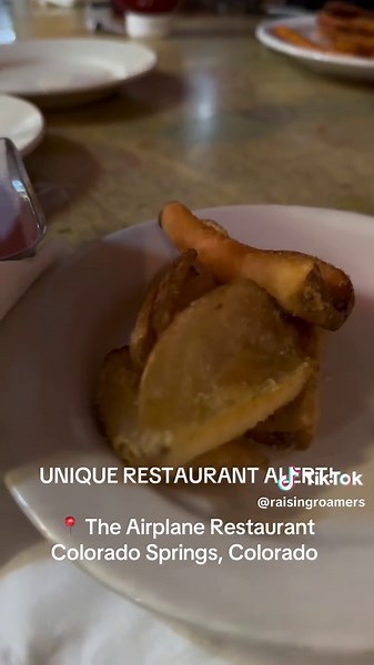 UNIQUE RESTAURANT ALERT! 📍 The Airplane Restaurant Colorado Springs, Colorado This is an old military style airplane that’s literally embedded into the main dining area. You can explore the cockpit, check out some historic decor, and even eat in the main area of the plane. Their food was great and the fries literally became my favorite fries I’ve ever had. Give it a shot next time you’re in the area! #uniquerestaurants #airplanerestaurant #coloradospringsrestaurants #wheretoeat #creatorsearchin