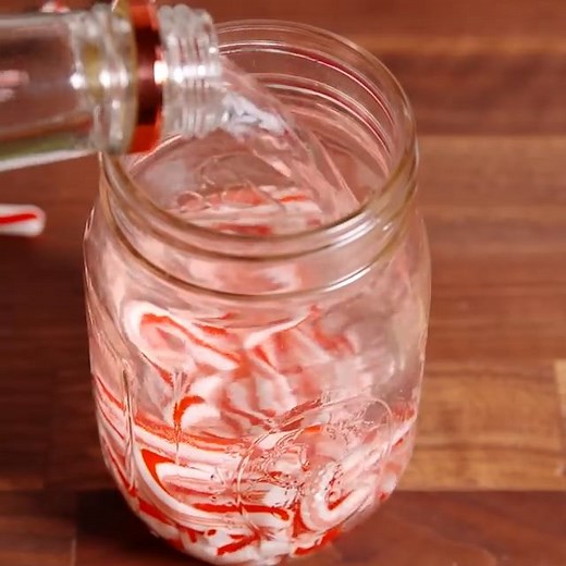 Get ready to throw back Candy Cane Vodka allll winter. Full recipe: http://dlsh.it/7nGuABM | Delish