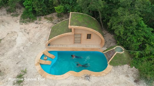 Watch these jungle builders shape a dream underground house with a pool