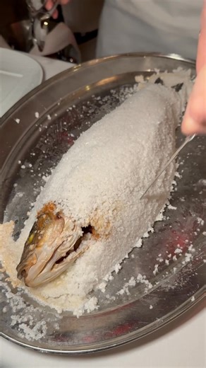 Salt baked whole fish is NOT just a party trick! ✨ The salt allows this Lavraki to cook gently and evenly... and the end result is perfectly seasoned and moist! #FoodNetworkFinds 📍: Estiatorio Milos in Hudson Yards, NYC | Food Network