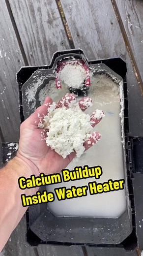 Cleaning out scale and calcium buildup from inside a water heater. #plumbing #bluecollar #foryoupage