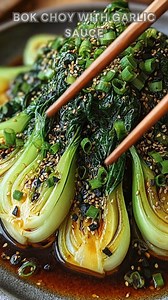 Bok choy sliced clean. Sprinkle garlic, soy, sesame. Sauté on medium heat for 1–2 minutes. Tender, glossy, savory greens with a garlicky shine. Ingredients ➤ 1 lb baby bok choy, halved ➤ 1 tbsp vegetable oil ➤ 3 cloves garlic, minced ➤ 1 tbsp soy sauce ➤ 1 tbsp oyster sauce ➤ 1 tsp sesame oil ➤ 1 tsp rice vinegar ➤ ½ tsp sugar ➤ 2 tbsp water FULLL Recipe in First Cօʍʍеոτ 👇👇 | Nessy Recipes