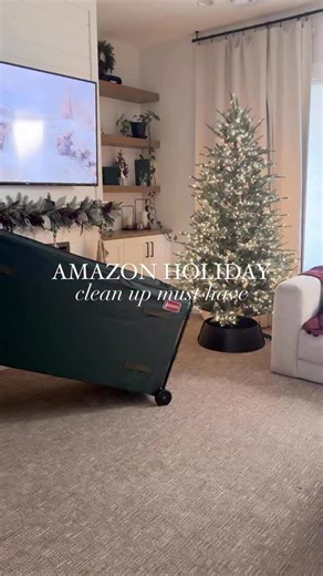 Karisa Udy | Kailye Adair on Instagram: "✨COMMENT LINK✨ and we’ll DM you the link for this XL tree holder from Amazon! 🎄It can hold multiple trees or trees up to 15 ft! It also has a designated space for things like tree toppers! #amazonhome #amazonholiday #thesistershoppers #amazonmusthaves #organizedhome"