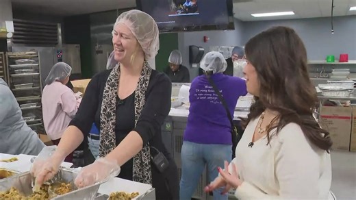 Volunteers cooking Thanksgiving meals for people in need at Ivy Tech