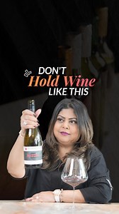 Stop holding a wine bottle by its neck! ❌ If you grip a bottle from its neck, you’ll have poor control over how much wine you pour and this could lead to spoiled linen or stubborn wine stains on your clothes. Here is the correct way to hold the bottle while pouring wine: 1) Hold the bottle from its base as this will give you better control while pouring. If you have large hands, try placing your thumb in the indentation beneath your bottle (also known as punt) for a better grip. 2) Twist the bot