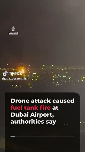 Footage shows a fire burning near #Dubai International Airport after a drone ignited a fuel tank, according to authorities in the UAE. Flights have been suspended. Civil defence crews say the blaze is under control. #news #UAE