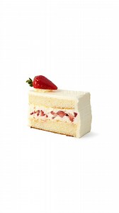 World famous Wedding Cake Slice! Delicate white cake filled with our signature Bavarian cream, iced with our rich European buttercream, and layered with ripe California strawberries. 🍓 The perfect cake slice for a Vegas visit! #freedsbakery #freedsbakerylasvegas #lasvegas #chocolate #chocolatecake #cakeslice #cakes #lasvegascakes #desserts | Freed's Bakery