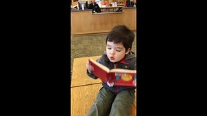 Sharing a moment with a cute little reader. | Multnomah County Library