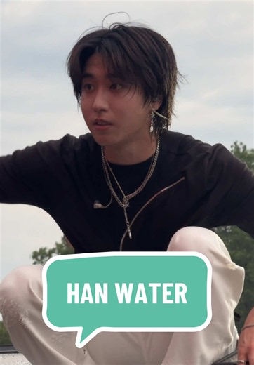 Han giving water to fans at Gov Ball - Stray Kids moment