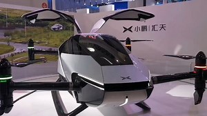 6.4M views · 1.8K reactions | Flying #cars are coming! A close look at the #flyingcar displayed at the second #China International #Consumer #Products #Expo. Made of carbon fiber, the flying car only weighs about 500 kg and can carry two passengers. With a maximum speed of 130km/h and maximum flight altitude of 1,000 meters, it is expected to be mass produced and launched in 2024. | WE ARE CHINA | Facebook