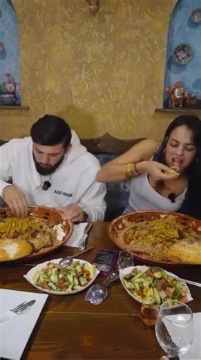 Arman Tsarukyan teaches Nina Drama how to eat Plov | UFC