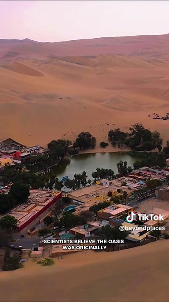 How is there a tropical oasis in one of the driest deserts on Earth? 🤯🇵🇪 Meet Huacachina, Peru’s legendary desert village, where fewer than 100 people live surrounded by towering dunes and a lagoon born from local legend. Would you explore it? Discover how to visit through the link in bio 🔗 🎟️GetYourGuide code: BEYONDPLACES5 #Huacachina #Peru #oasis #desert #visitperu