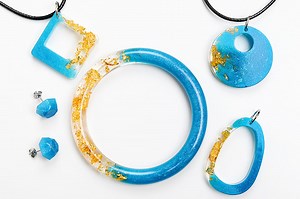 One of the COOLEST resin craft ideas! https://onelittleproject.com/resin-jewelry/ | One Little Project