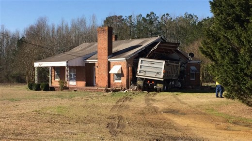 A dump track crashes into a house after colliding with a driver who ran a stop sign. #RoadWars | A&E