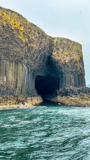 Fingal’s Cave, located on the uninhabited Isle of Staffa in the Inner Hebrides of Scotland, is a spectacular sea cave formed entirely from hexagonally jointed basalt columns, the result of ancient volcanic activity. Famous for its natural acoustics and cathedral like atmosphere, Fingal’s Cave draws thousands of visitors annually for its dramatic geological formations, echoing waves, and rich cultural history. The cave was named after the mythical hero Fingal and has inspired countless artists, p