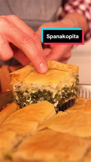 This amazing Spanakopita is my Favorite Greek Dish! It’s a symphony of onions, garlic, dill, spinach, and feta wrapped in paper thin crisp filo dough. Recipe up on the blog #preppykitchen #baker #recipevideo #foryou