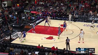 Zach hits the corner three over a defender